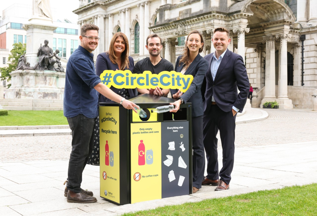 Press Eye Northern Ireland

Wednesday 26th July 2023 

Photo by Darren Kidd // Press Eye 

Beau Zilesnick, Project Lead at environmental charity Hubbub; Gillian Shields, Sustainability Partnership Manager, Coca-Cola HBC; Cllr Micky Murray, Chair of the People and Communities Committee, Belfast City Council; Agnese Filippi, Country Manager, Coca-Cola Ireland and Conor Neylan, Communications and Sustainability Director at The Coca-Cola Company came together to launch Belfast #CircleCity, a new on-the-go recycling initiative that is being rolled out in Belfast city centre, made possible with funding from The Coca-Cola Foundation. As part of the initiative 25 bright colourful bins have been installed in Belfast city centre as well as a number of public parks. The three-month trial will make it as easy as possible for residents and visitors to recycle plastic bottles and cans and therefore improve recycling rates. For more information visit www.belfastcirclecity.co.uk or follow Belfast #CircleCity across social media channels.