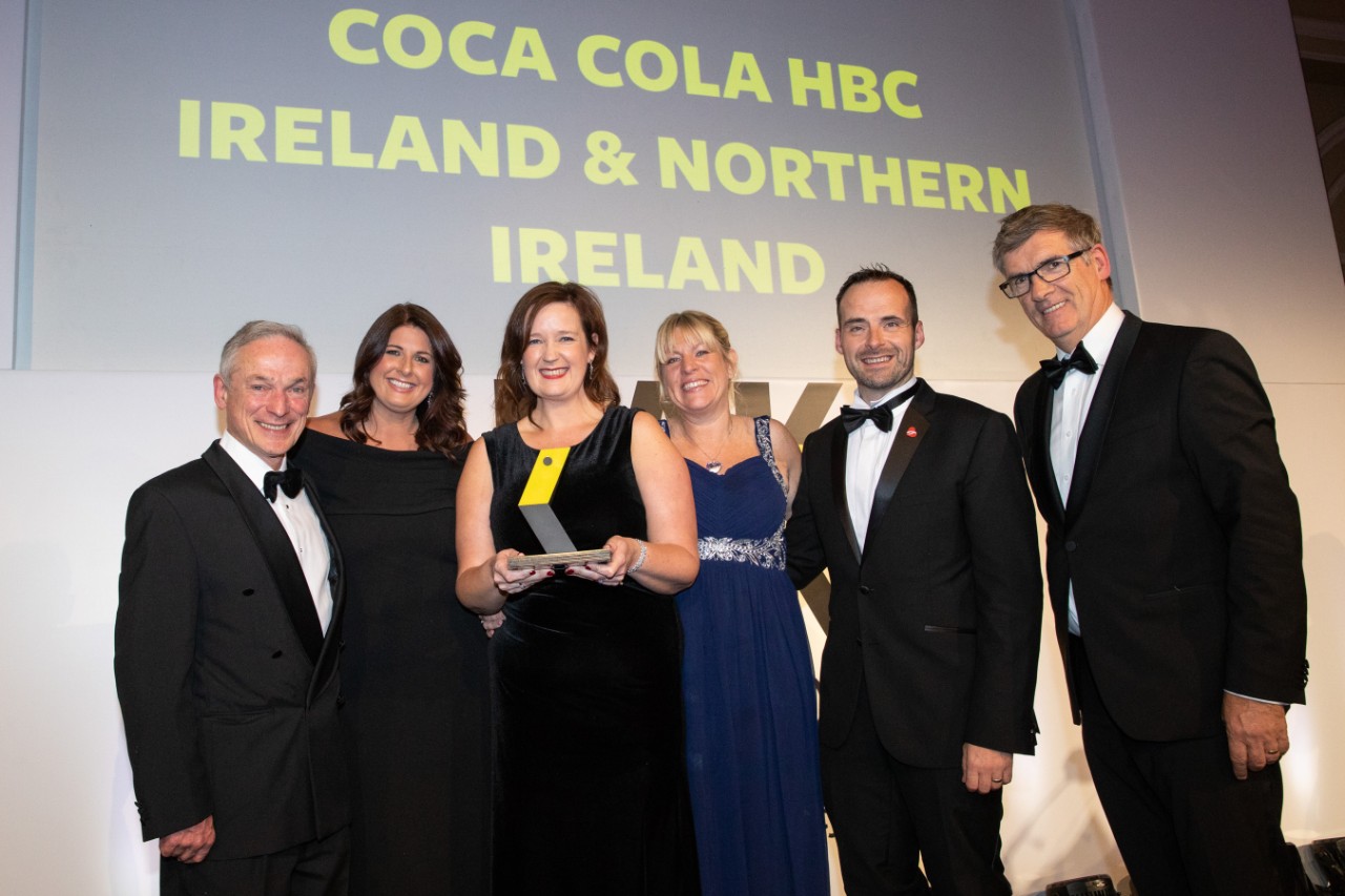 Plastic Pledge Member of the Year – Winner: Coca-Cola HBC Ireland and Northern IrelandPictured at the Pakman Awards 2019 are (l to r): Minister for Communications, Climate Action and Environment Richard Bruton, TD, Gillian Shields, Louise Sullivan, Tara O’Rourke, and Mark Haughey from Coca-Cola HBC Ireland and Northern Ireland, winner of the Plastic Pledge Member of the Year Award sponsored by Repak, and Tony Keohane, Chairperson of Repak.The judging panel chose Repak member, Coca Cola HBC Ireland and Northern Ireland, for its commitment to minimising avoidable plastic packaging and promoting packaging reuse in accordance with the Repak Members’ Plastic Pledge, including introducing Ireland’s first 100% recycled PET bottle across its Deep River Rock range, eliminating almost 5,000 tonnes of virgin PET annually from the supply chain. The Pakman Awards 2019, which took place at the InterContinental Hotel in Dublin last night, saw 400 representatives from leading businesses, organisations and community groups come together to recognise excellence in recycling, sustainability and waste management.For more information on the 2019 Pakman Awards visit pakman.ie.