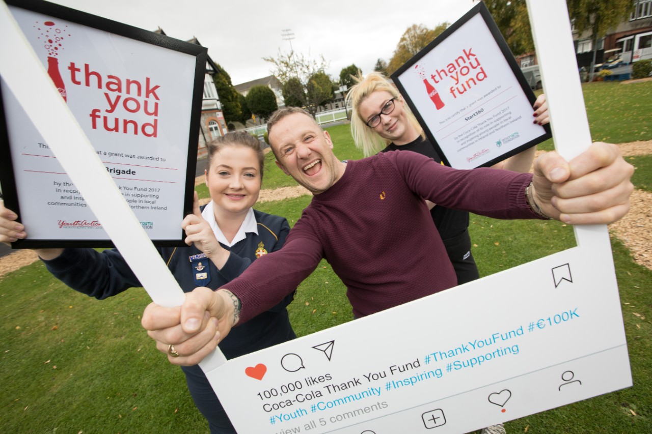 No repro fee12-10-2017***Coca-Cola’s Thank You Fund Awards €100,000 to Community Projects Serving Young People Across Ireland and Northern Ireland: **Pictures shows from left Amy Clements,Girls' Brigade,Co Antrim;PJ Gallagher, Coca Cola Thank You Fund Ambassador; and Tara Vize,Start360,Co Antrim as Coca-Cola today announced this year’s Thank You Fund award recipients and the successful non-profit organisations were presented with their certificates during a celebration at Zeminar, Ireland’s largest youth conference (RDS Dublin). A total of €100,000 has been granted to 14 community groups across Ireland and Northern Ireland for innovative projects that will support and inspire young people.Pic:Naoise Culhane-no fee