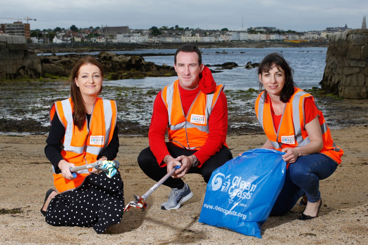 No repro fee31-5-19Picture shows from left Ciara Cashen, Coca-Cola HBC; Paddy Christie, Dublin GAA All Star; and Sinead McCoy, Clean Coasts Manager marking Coca-Cola Clean Coasts Week which is running from 1st – 9th June nationwide, with over 180 beach cleans taking place across the Irish coastline. For more information see cleancoasts.org Pic:Naoise Culhane -no fee